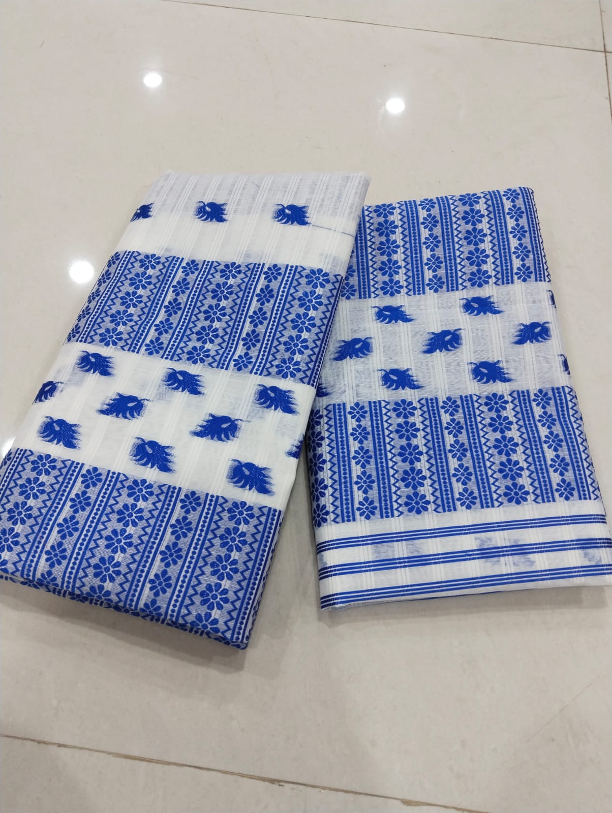Kesapatt Blue & White Cotton Slub Mekhela Sador Set – Gari Diya Jacquard Design
